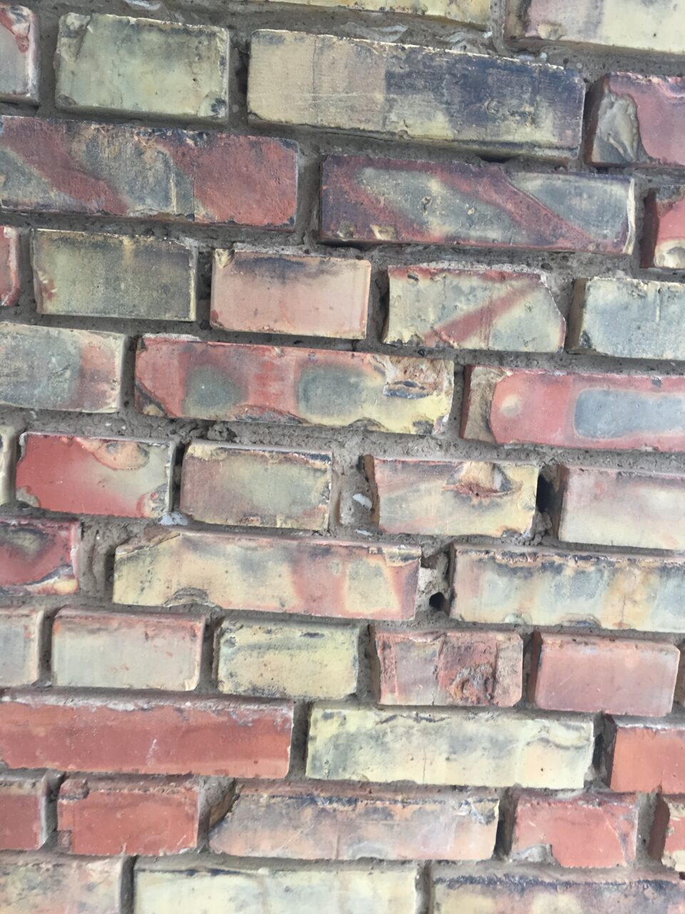 Omfogning tegelfasad.